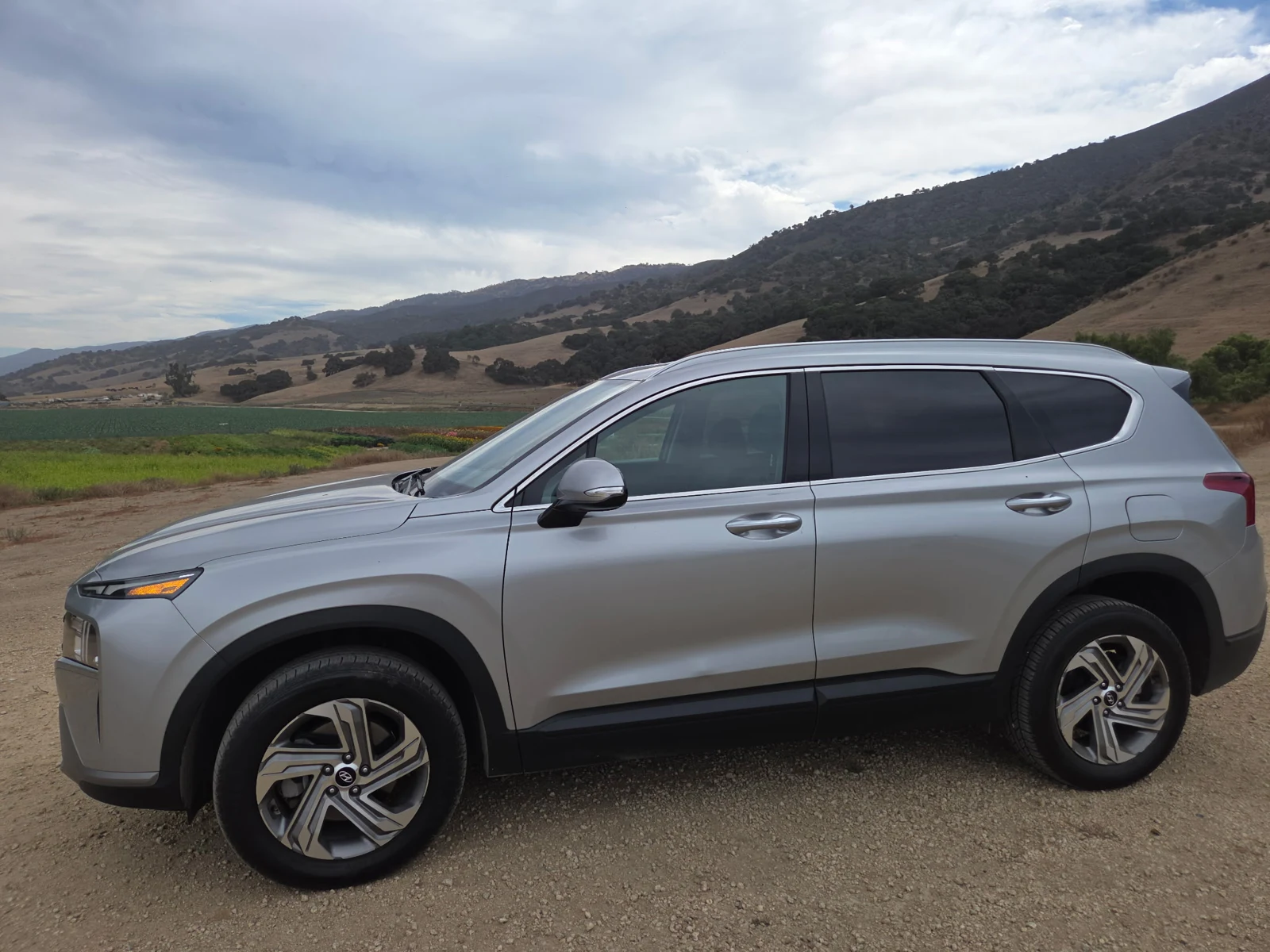 California Horizon Tours' silver SUV on the Central Coast